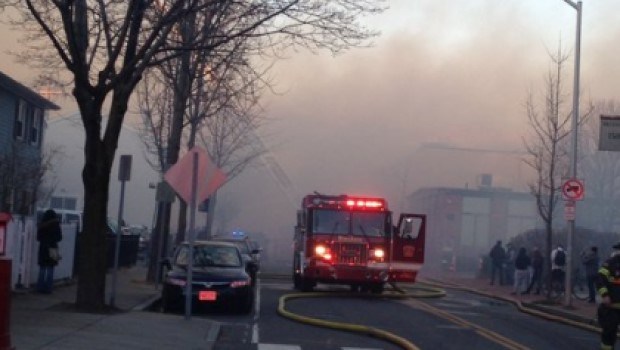 Firefighters battle 10-alarm blaze in Cambridge, Mass.