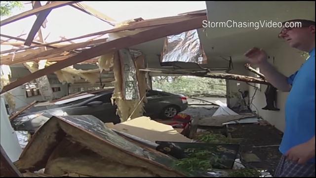 The National Weather Service said the tornado was part of a super cell storm that formed over the Kansas City metropolitan area earlier Saturday and continued eastward, spawning at least one more tornado that also struck near the town of Marshall.