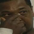 Man bites neck of dog mauling him