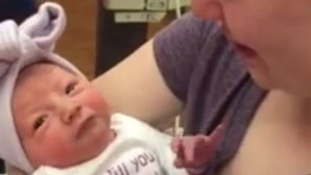 Man's proposal with newborn goes viral